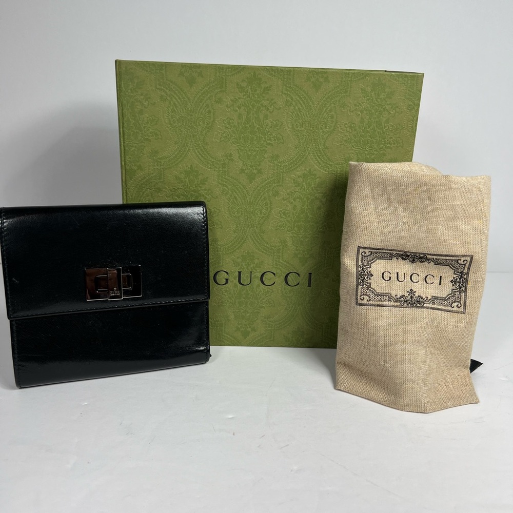 Gucci trifold dark Navy almost black leather wallet. Box and dust bag included